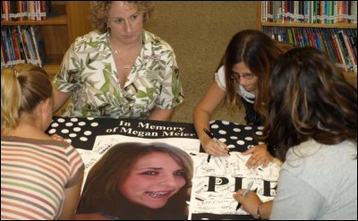 Tweenangels Signing a Megan Pledge Banner.
